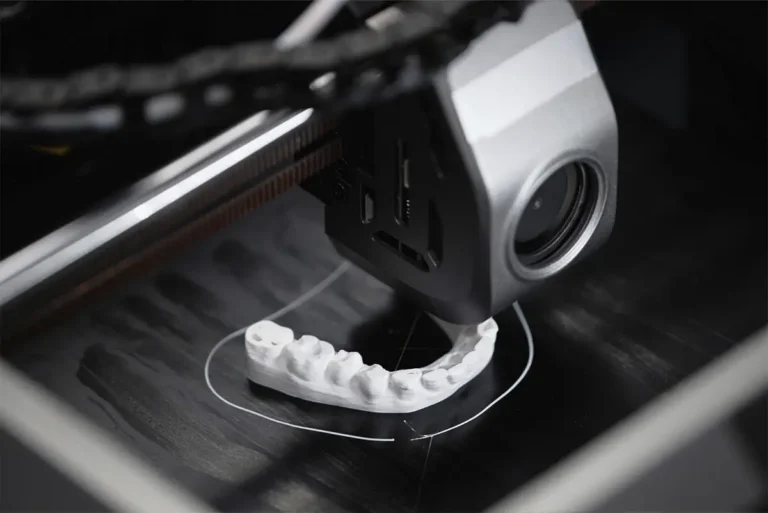 3D Printer Dental Tech for Teeth Models at Cinco Ranch Dental in Katy, TX